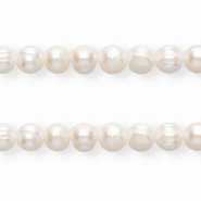 Imperfect freshwater pearls round 9-10mm Natural White