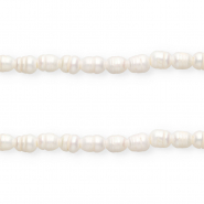 Imperfect freshwater pearls rice 11x9mm Natural White