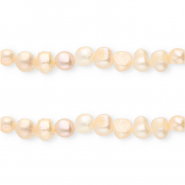 Imperfect freshwater pearls round 7-9mm Peach Rose