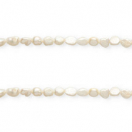 Imperfect freshwater pearls nugget oval 9x7-8mm Natural White