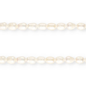TQ Freshwater pearls rice 11x8mm Natural White