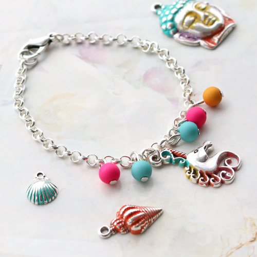 Cheerful ImpressArt jewellery, coloured with Vintaj Patina metal colouring