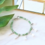 Colourful jewellery in soft pink and green shades faceted beads