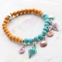 Cheerful ImpressArt jewellery, coloured with Vintaj Patina metal colouring