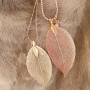 Delicate necklaces decorated with autumn leaf pendants 
