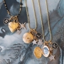 Create festive necklaces with pretty medallion, rhinestone and letter charms