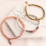 Enter the new year festively with bracelets made of hematite beads