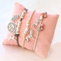 Elastic bracelets and layered necklaces with metal charms