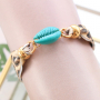 Handmade statement earrings + bracelets with snake print 
