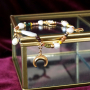 Create earrings and bracelets in wintery colours with glass seed beads