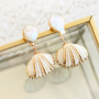 Necklaces and earrings with the latest collection of shell pendants: