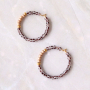 Making necklaces with glass seed beads, stainless steel beads and charms: 