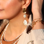 Chain jewellery in combination with freshwater pearls and shell beads