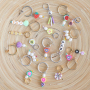 Creating fashionable charms with various acrylic beads and DQ European metal rainbow headpins