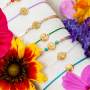 Create personalized bracelets with Birth Flower beads 