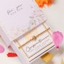 Create personalized bracelets with Birth Flower beads 