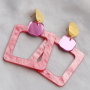 Get creative with statement charms