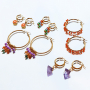 Design an earring collection with stainless steel creoles