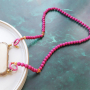 Design various pieces of jewellery with acrylic beads