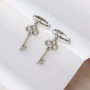 Design earrings and necklaces with key charms