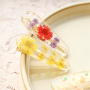 Dried flower bracelets with matching hair clips