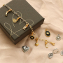 How to design bracelets and earrings with DQ pendants and charms