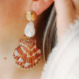 Get creative with large shell pendants