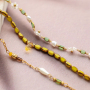 Get creative with oval glass beads with gold rim