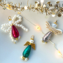 Create magical designs with Polaris drop shaped beads and angel details!