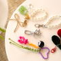 Design bold accessories with statement charms