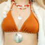 Get creative with large shell pendants and beads