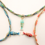 Mix & match with a necklace with faceted beads and heart earrings