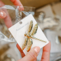 Mix & match with statement brooches 