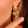 Inspiration with brass charms and summer details