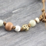 Beautiful natural beads made of jade and agate,threaded and with a knotted technique