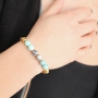 Pretty jewellery with marbled glassbeads,tassels, round sead beads and nice Designer Quality pearls and beads!