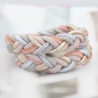 Trendy and tough;bracelets in bright colors made of stitched faux leather