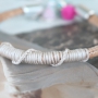 Faux eco nappa stitched leather and bright coloured beads put together as a trendy creation!