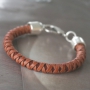 Work with layers like different kinds of round and braided DQ leather