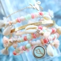 Complete your beach look with homemade jewellery made of bright coloured marvelous shell beads!