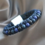 Stylish jewellery with acrylic beads and diverse stringing materials in dark tones like blue and anthracite. 