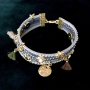 Shiny jewellery of faux suede with strass, Swarovski and DQ metal