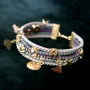 Shiny jewellery of faux suede with strass, Swarovski and DQ metal